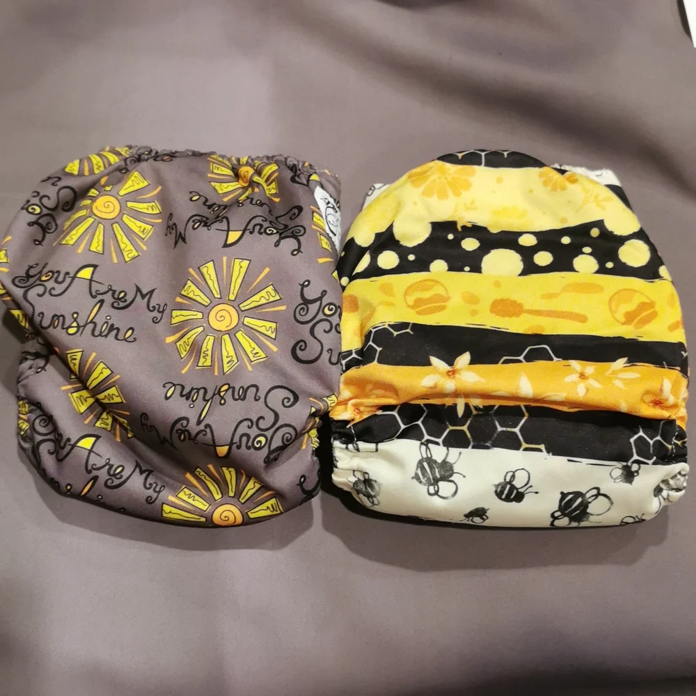2 Reusable pocket cloth diapers, You are my Sunshine, bee hive, yellow